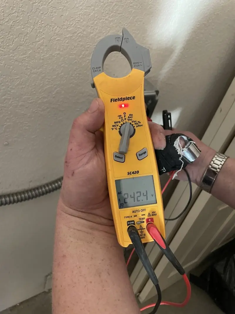 Voltage testing with clamp meter during Ceiling Fan Installation in Kittanning